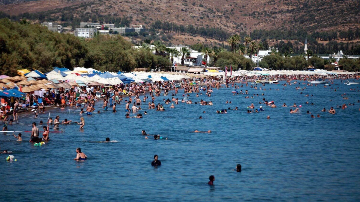 ege denizinde deniz suyu sicakligi artti yuzme sezonu 11 gun uzadi 2 jm8q6NNb